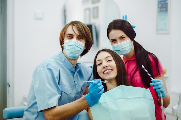 Happy Dentists With Patient 1153 649