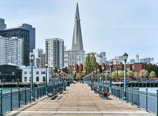 A Bridge With A City In The Background