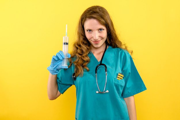 Front View Female Doctor Holding Big Injection Yellow Space 179666 13284